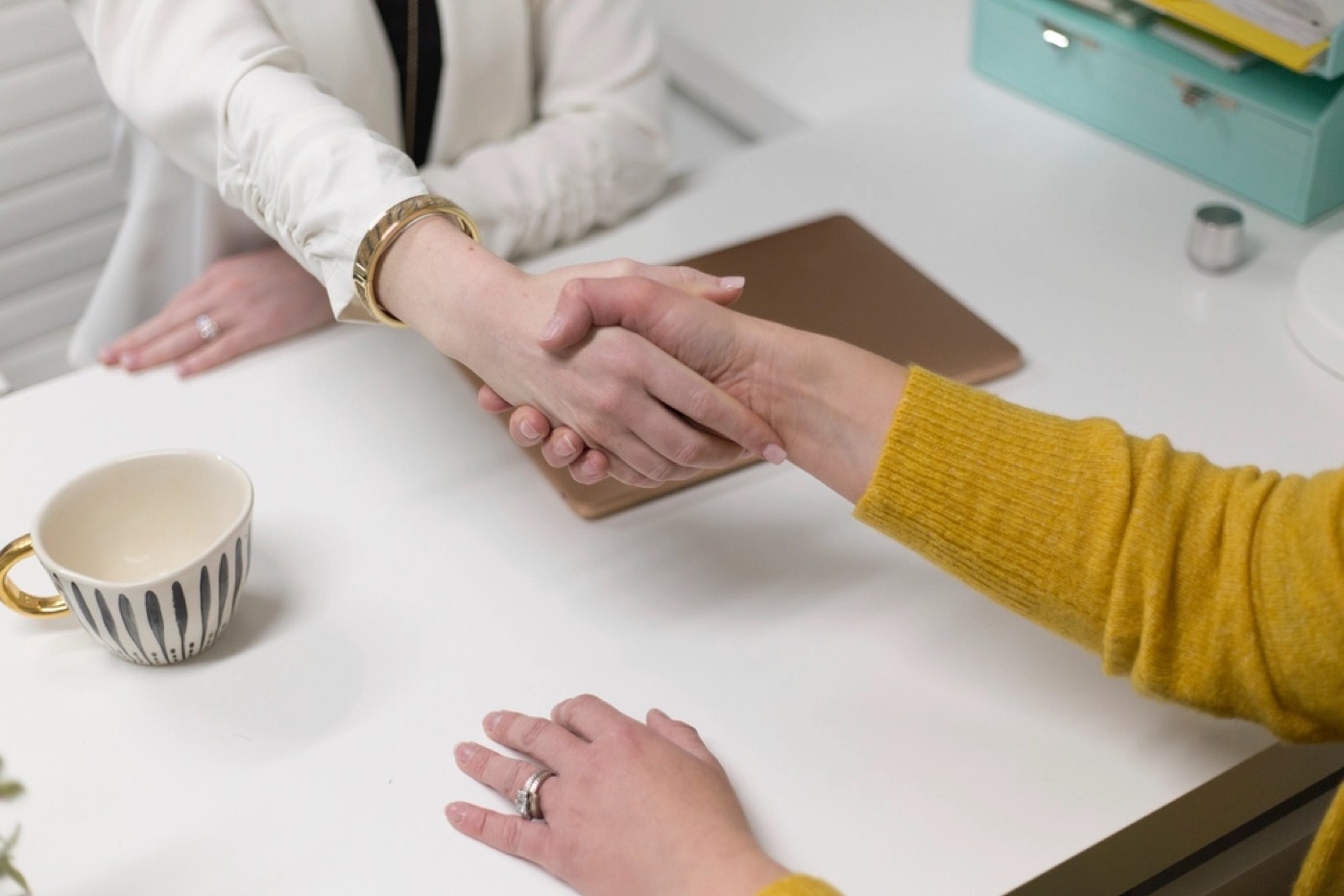 A handshake over a rental agreement