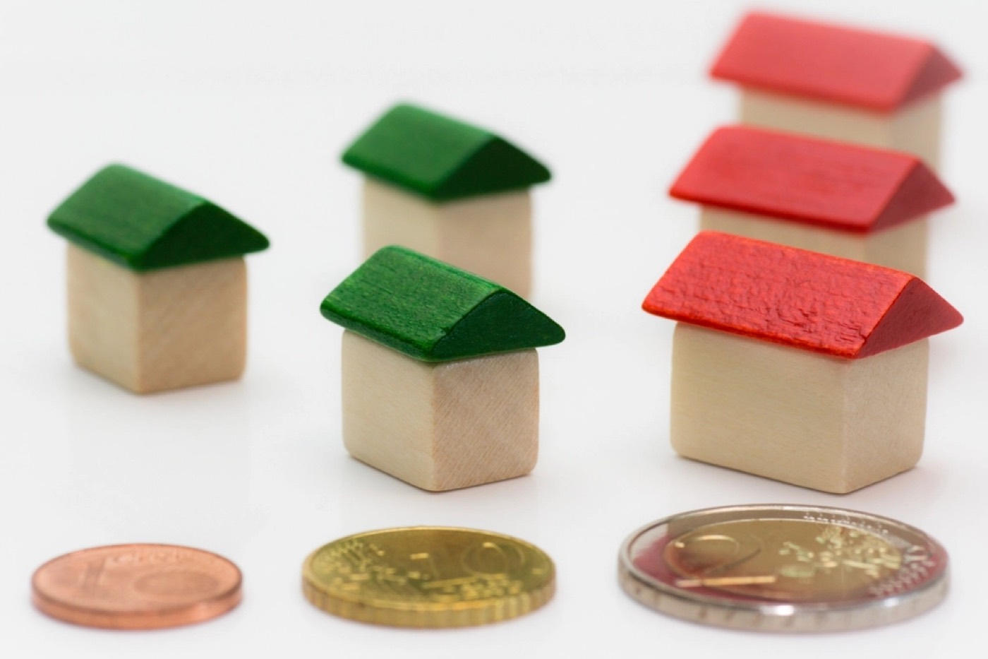 Budgeting the cost of living with coins and model homes