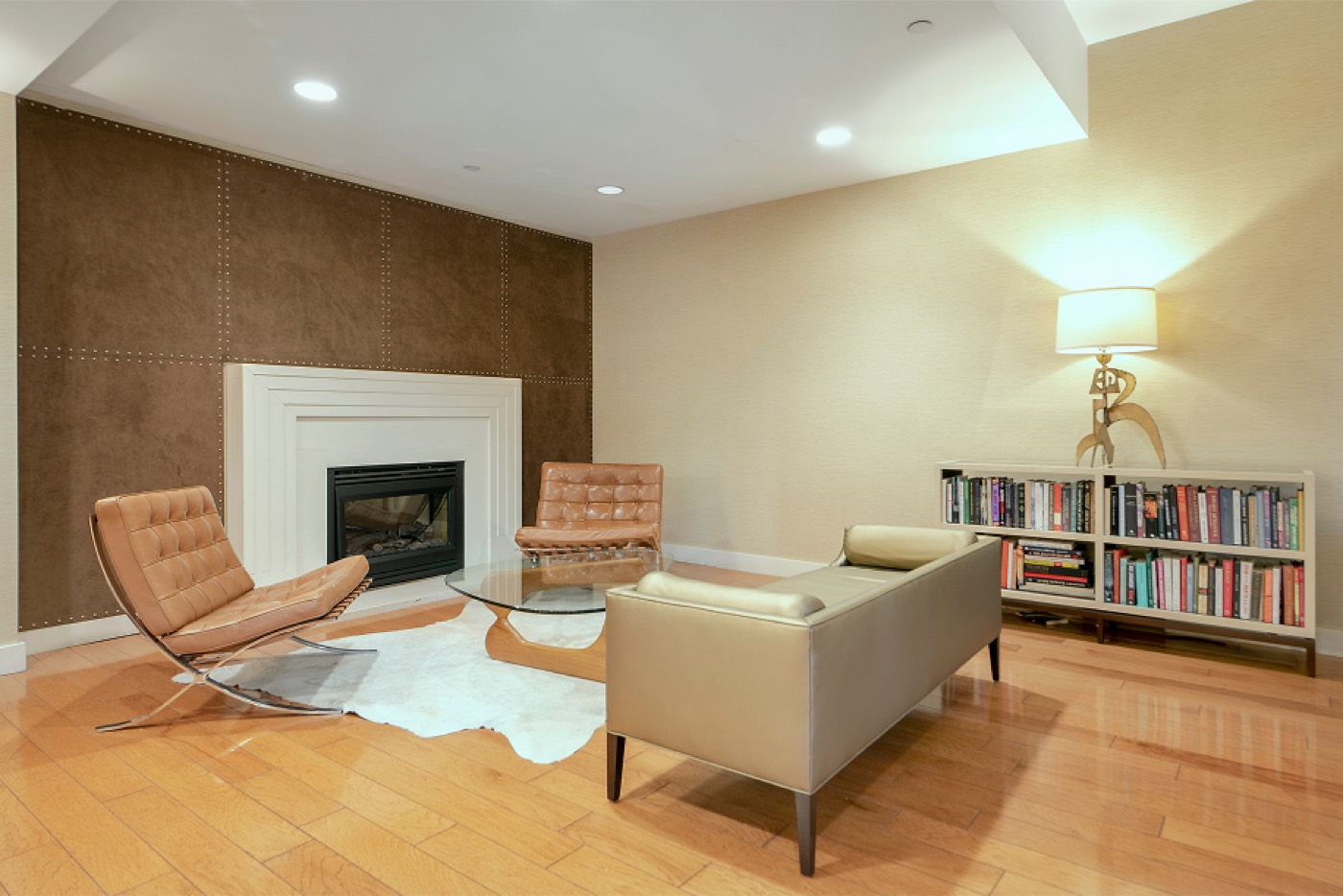 The Anthem resident lounge with fireplace, set for hosting