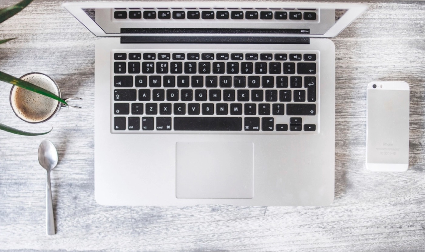 A laptop set up for a remote video apartment tour